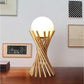 Lampada da tavolo in metallo tubolare sfera vetro G9 lume bronzo D32
