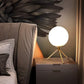 Lampada da Tavolo Minimalista Bronzo con sfera in Vetro Bianco Design Elegante per Illuminare e Decorare Spazi Interni Adatta a Comodini Scrivanie e Tavolini Altezza 30 cm (1 sfera con treppiede) D35